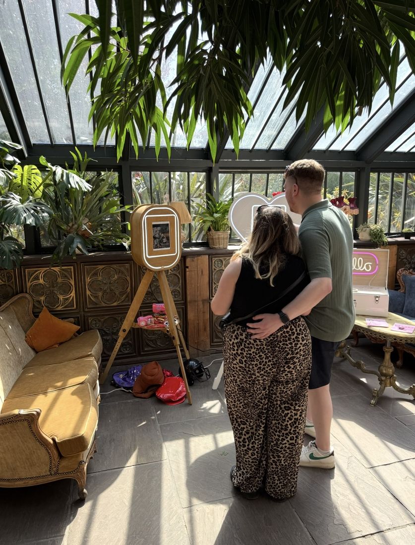 Guests using the Booth66 traditional selfie pod